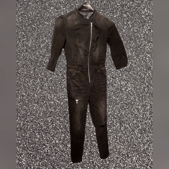 Size 28 Black Cut-Out/Distressed Jean bebe Jumpsuit - Picture 1 of 3